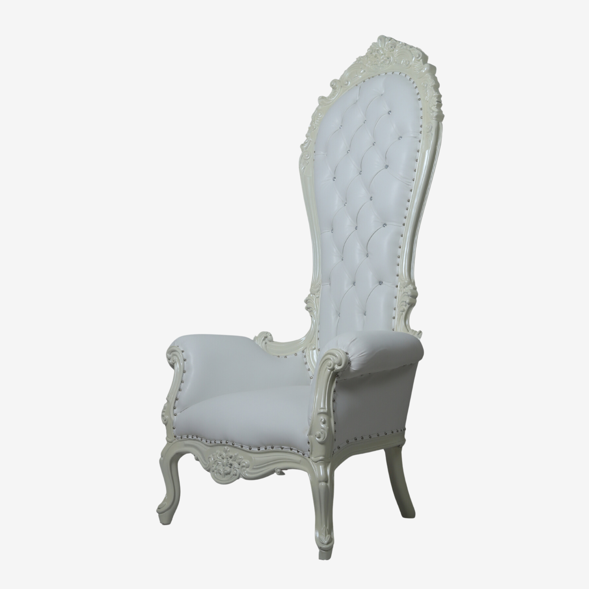 Side profile of Silver Chic chair showcasing gently curved silhouette and refined detailing.